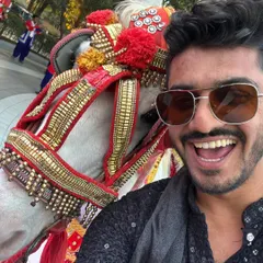 It's not every day you get a selfie with a ghodi! A fun, behind-the-scenes moment from a baraat, showing my playful side.