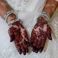 The stain is everything. This photo showcases the gorgeous, deep maroon stain from my all-natural, organic henna, captured on an engagement bride. This is the rich, chemical-free color I promise and deliver.