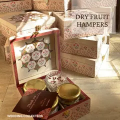 Dry fruit hampers are a classic and healthy wedding favor. I designed these beautiful printed wooden boxes filled with assorted nuts and a scented candle.