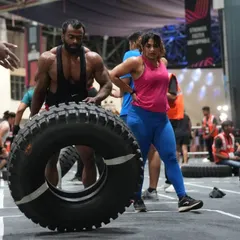 Teamwork in action. My partner and I worked together to conquer every obstacle, showing the power of support and shared determination during a high-intensity fitness competition.