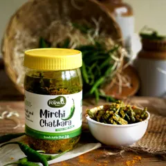 A closer look at my Mirchi Chatkara pickle. You can see the pieces of green chilli mixed with mustard seeds and other spices, all preserved in oil.