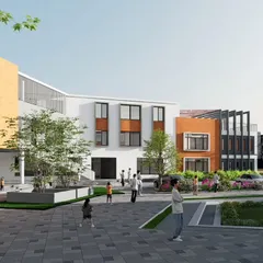 A view into the central courtyard of the KPS School in Badami. We transformed a challenging triangular plot by arranging classroom wings along the perimeter, creating a large, secure, and interactive open space for students. The design incorporates playful elements and greenery to foster a vibrant school community.