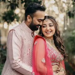 A quiet, stolen moment between the bride and groom amidst the Haldi celebrations. It's these candid shots, full of genuine emotion, that truly capture the essence of the day.
