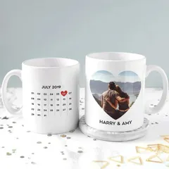 This customized photo mug features a calendar on one side with your special date marked, and your photo and names in a heart on the other side.