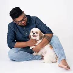 A man and his best friend. The bond between a pet owner and their dog is so special, and I love capturing these moments of quiet connection.