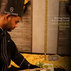 We blend passion and precision to craft unforgettable flavors. Our chef proudly presents a towering Mutton Seekh Kebab, a testament to the showmanship and skill at our live stations.