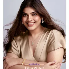 She celebrates herself with natural diamonds that echo her strength and grace. Here, she wears a delicate pendant necklace, matching earrings, and a bracelet, each piece designed for effortless, everyday elegance.