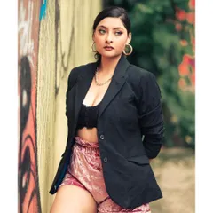 A supporting image from the 'BOSS LADY' campaign. Consistency in styling and location helps build a recognizable and memorable brand story across multiple posts.