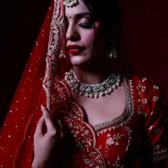 A bridal portrait is more than just a photo. Using dramatic lighting and focusing on expression, I create cinematic shots that reveal the bride's personality and mood on her big day.