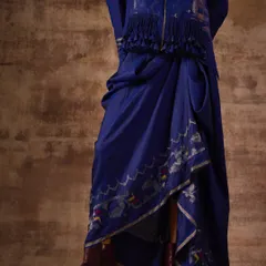 A detail shot from a campaign focused on Indian textiles. I styled this draped indigo skirt with ankle boots to create a contemporary, indo-western look that highlights the intricate prints and unique silhouette of the garment.