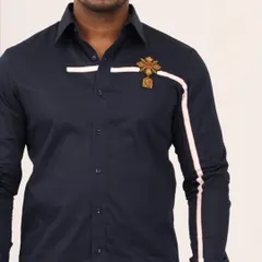 A close-up of the chest area, showing the detailed hand embroidery of the golden crest and the crisp white stripe. This is a perfect example of my focus on sophisticated accents.
