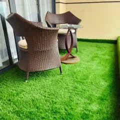 A simple balcony can become a comfortable, green retreat with my artificial grass. This installation shows how easily you can create a soft, clean, and usable outdoor space, perfect for a small seating area.