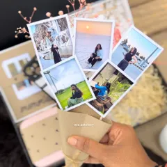 I turn your favorite photos into a beautiful, handheld photo bouquet. It's a unique and personal way to display cherished memories, making it a standout piece in any gift hamper.