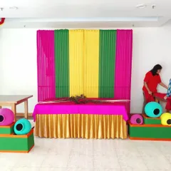 Another angle of the Janamashtmi setup in progress. The design is simple yet festive, perfect for creating a devotional atmosphere in a society clubhouse or home.
