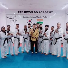With fellow coaches during a Taekwondo coach license training session at the Korean Cultural Centre India.