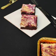 This is my marbled brownie, which beautifully swirls rich chocolate brownie batter with a complementary flavor. The result is a treat that is as visually appealing as it is delicious.