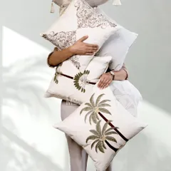 Our latest collection of cushion covers celebrates artistry in every thread. This assortment features a mix of botanical elegance, including palm trees, and timeless trellis patterns in earthy neutrals.