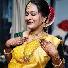 A radiant mom-to-be at her Seemantham (baby shower). I created a traditional South Indian look with glowing skin, defined eyes, and a beautiful floral hairstyle.