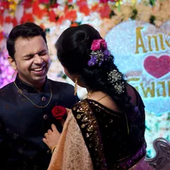 The best moments are often the ones filled with laughter. This candid shot from Amey and Swarali's engagement captures a moment of pure joy and connection between the couple.