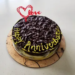 A special anniversary cake for a couple who loves coffee flavors. This is my signature dark chocolate cake soaked in Kahlua, making it a rich and boozy treat to celebrate their love.