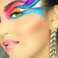 A close-up of the Brazilian-inspired look, showcasing the intricate blending of bold colors, glitter, and sharp graphic lines. I teach you how to master these advanced techniques.