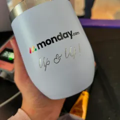 Besides names, I also engraved fun phrases like "Up & Up!" on the tumblers for the Monday.com event. It's a great way to incorporate brand messaging into a personalized gift.