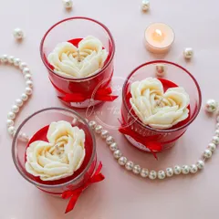 My 'Te Amo' jar candles, created for this year's Valentine's collection. This version features a white, heart-shaped rose in a red-accented glass.