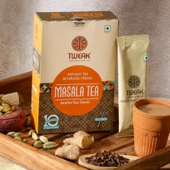 A warm and inviting scene for Masala Tea, styled with a traditional clay kulhad and whole spices like cardamom, cloves, and ginger on a wooden tray.