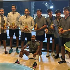 The champions with their trophies. We make sure to recognize effort and achievement, giving teams a tangible reminder of their successful corporate outing.