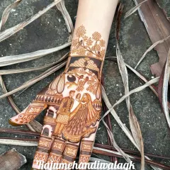 This Karwachauth design tells the story of a couple's varmala (garland exchange) ceremony. We can capture specific wedding moments like this to make your mehandi truly one of a kind.