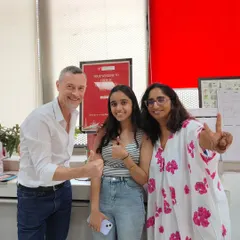Our director, Frédéric Wolska, and one of our professors congratulate Nishika Talwar on her victory. Her success is a wonderful example of the high level of French proficiency our students achieve.