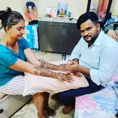 This is me, Kapil, at work. I provide a comfortable and professional mehendi service right in your home, so you can relax while I create the perfect design for your occasion.