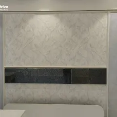 This bedroom wall combines a soft, marble-like texture with decorative patterned panels. This mixed-media approach adds layers of visual interest and a custom, high-end feel to the space behind the bed.