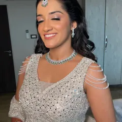 For her engagement day, she wanted to feel like herself, just softer and glowier. We kept it clean with fresh skin and soft lids to match her diamond glow.