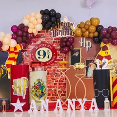 A detailed look at our Harry Potter themed party setup. We included iconic elements like the Platform 9 3/4 sign, house banners, and themed props to transport guests straight to the wizarding world.