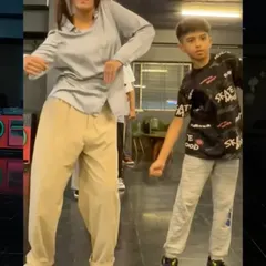 Drills are the foundation of all great dancers. I make sure our training sessions are engaging and fun, so learning tough techniques feels like a treat, not a task. Here, we're working on popping drills and body control.
