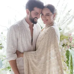 A heartfelt portrait of Sonakshi and Zaheer. For their intimate ceremony, we created a design that was all about quiet luxury, allowing their love and happiness to shine through.