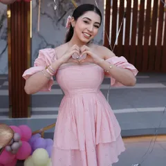 We were honored to create the decor for this special 100k followers celebration. Here is the lovely influencer posing with the vibrant balloon setup we designed for her milestone.