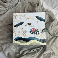 The exterior of one of our premium Diwali gift boxes. The design features a beautiful blend of marble texture and tropical leaf motifs, making the box a keepsake in itself.