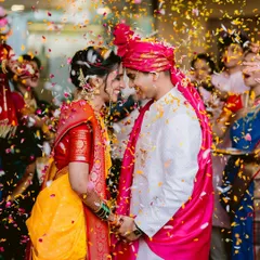A shower of petals and blessings. This single frame from Ravija and Samarth's Mumbai wedding is bursting with the joy and energy of the Varmala ceremony, a moment of pure celebration.