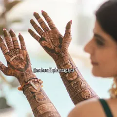For this bride, we wove her entire story into the design. The arms feature panels with meaningful symbols and dates, while the palms hold custom figure work, creating a truly personal piece of art.