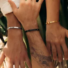 Showcasing the versatility of my bracelets for everyone. Here you can see three different wrists wearing our adjustable cuffs in Silver, Black, and Gold finishes, proving they are truly unisex.