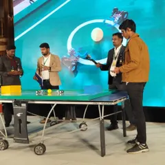 Our student being interviewed at the robotics football competition. Our program not only teaches technical skills but also builds the confidence to present and compete on a large stage.