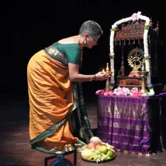 Beginning every performance with a prayer. Here I am, lighting the lamp before my student's recital, seeking blessings from the divine for a successful performance.