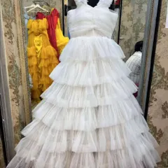 This white tiered ruffle gown is a dream for photoshoots. It's available for rent and looks amazing for both maternity and pre-wedding pictures.