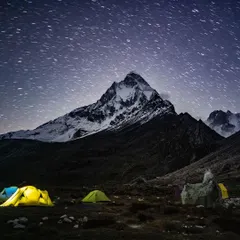 Under a moonless sky in Tapovan, with temperatures below freezing, the sacred peaks of Mt. Shivling and Meru were illuminated by stars. In these moments of profound stillness and cold, you feel a connection to something ancient and immense. It is a humbling reminder of nature's power to guide us toward awe and reverence.