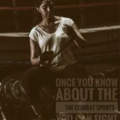 The moments before training are for focus and preparation. Here, a member of our community wraps her hands, a fundamental ritual that signifies readiness to learn, sweat, and grow stronger.