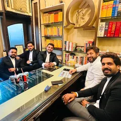 A strategy session with my team. I believe in a collaborative approach; having more brains on your side is a significant advantage when tackling complicated legal challenges for our clients.