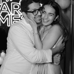 The raw emotion of a post-proposal hug, captured in classic black and white. This image is all about the feeling of overwhelming joy and love.