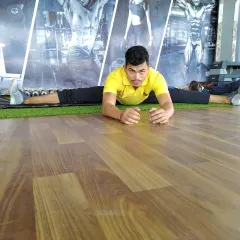 Close-up on the split, showing full engagement. This stretch targets the hamstrings and hip flexors.